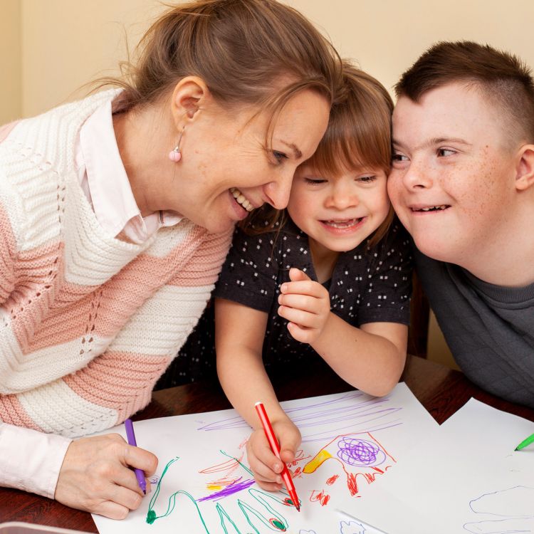happy-woman-with-children-with-down-syndrome
